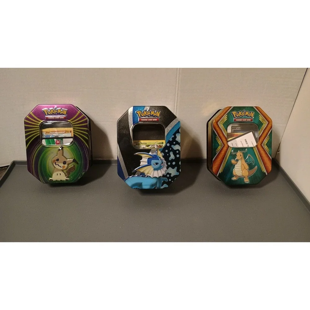 Pokemon TCG Tins Lot 3 Mimikyu Vaporeon Dragonite Assortment  of Trading Cards